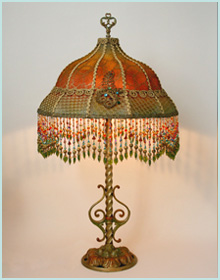 Antique lamp with beaded shade