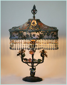 Antique tole  lamp with lace shade